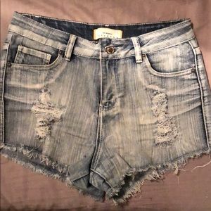 Distressed denim shorts